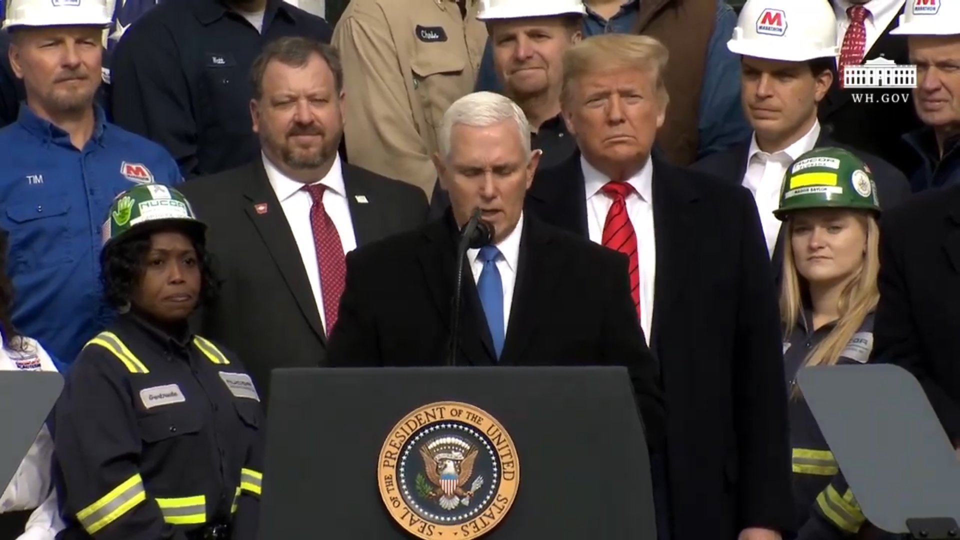 Vice President Mike Pence speaking at the USMCA signing event with Nucor Steel teammates Gertrude Pope, Nucor Steel Tuscaloosa (L) and Maggie Saylor, Nucor Steel Florida (R) behind him, along with President Trump. Also on stage (not pictured) were Matt Didelot, Nucor Steel Berkeley; Joe Craig, Vulcraft Texas; and Chris Paul, Vulcraft New York.